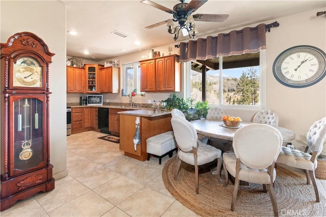 dining room featuring light tile patterned floors, recessed lighting, and ceiling fan