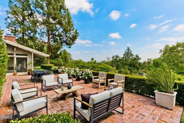 view of patio / terrace with an outdoor hangout area and outdoor dining space