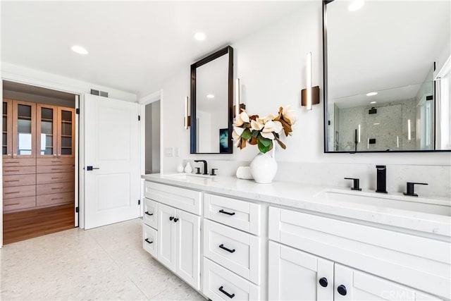 9 Jasmine Creek Dr, Corona Del Mar, CA 92625 - full bathroom with a shower stall, double vanity, and recessed lighting