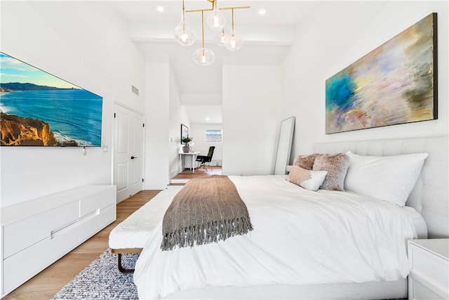 9 Jasmine Creek Dr, Corona Del Mar, CA 92625 - bedroom with light wood-type flooring, beam ceiling, a high ceiling, and recessed lighting