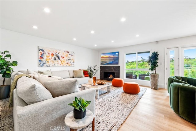 9 Jasmine Creek Dr, Corona Del Mar, CA 92625 - living room featuring a high end fireplace, recessed lighting, and light wood finished floors