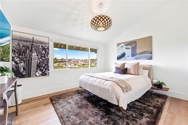 9 Jasmine Creek Dr, Corona Del Mar, CA 92625 - bedroom featuring wood finished floors and vaulted ceiling
