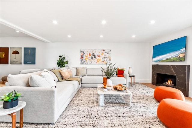 9 Jasmine Creek Dr, Corona Del Mar, CA 92625 - living room featuring recessed lighting, a high end fireplace, wood finished floors, and baseboards
