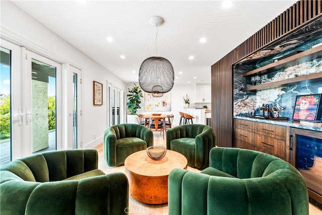 9 Jasmine Creek Dr, Corona Del Mar, CA 92625 - indoor dry bar with wine cooler, recessed lighting, french doors, light wood finished floors, and decorative light fixtures