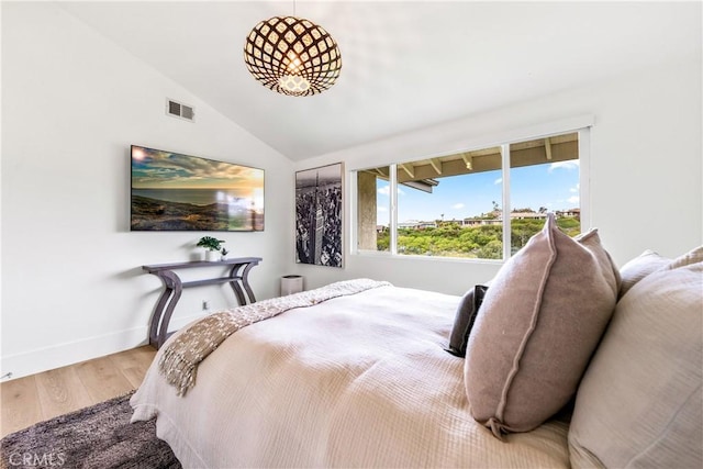 9 Jasmine Creek Dr, Corona Del Mar, CA 92625 - bedroom featuring wood finished floors, vaulted ceiling, and baseboards