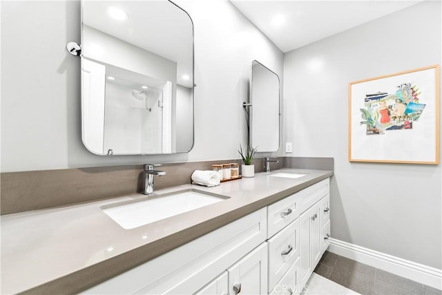 9 Jasmine Creek Dr, Corona Del Mar, CA 92625 - full bath with double vanity, a shower, baseboards, and recessed lighting