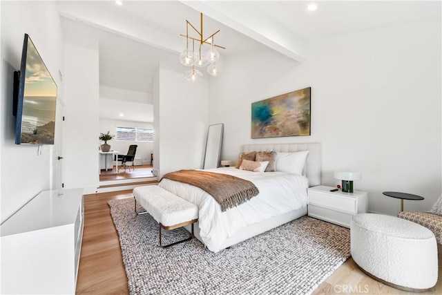bedroom featuring a chandelier, light wood-style flooring, beam ceiling, and recessed lighting
