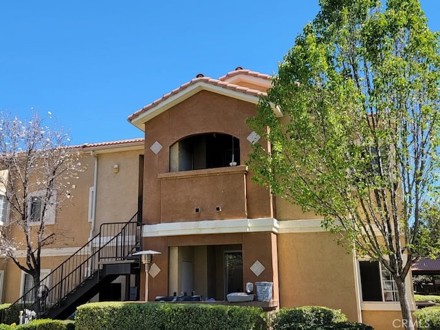 view of property with stairs
