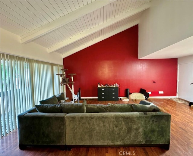 living area featuring beamed ceiling, high vaulted ceiling, wooden ceiling, and wood finished floors