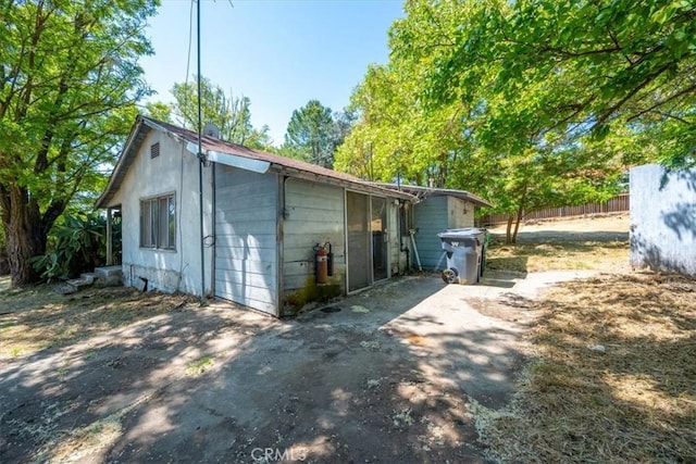 5985 Dolores Ave, Atascadero, CA 93422 - exterior space with a patio area, driveway, and fence
