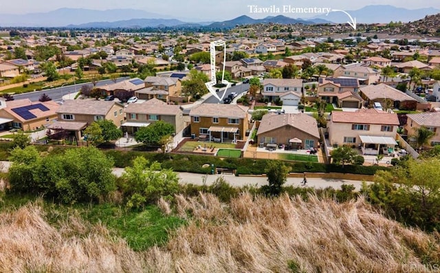 aerial perspective of suburban area featuring mountains