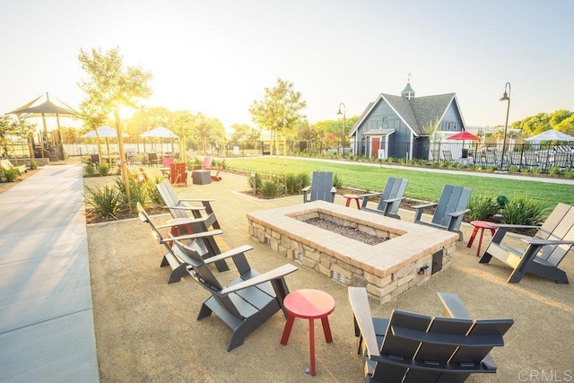 view of patio with an outdoor fire pit