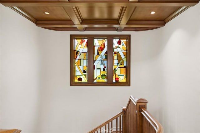 interior space with ornamental molding, coffered ceiling, beamed ceiling, and recessed lighting