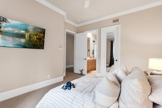 bedroom with baseboards, ornamental molding, carpet flooring, ensuite bath, and visible vents