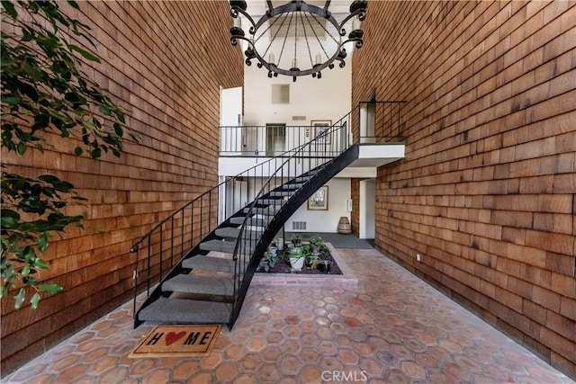property entrance with a patio and visible vents