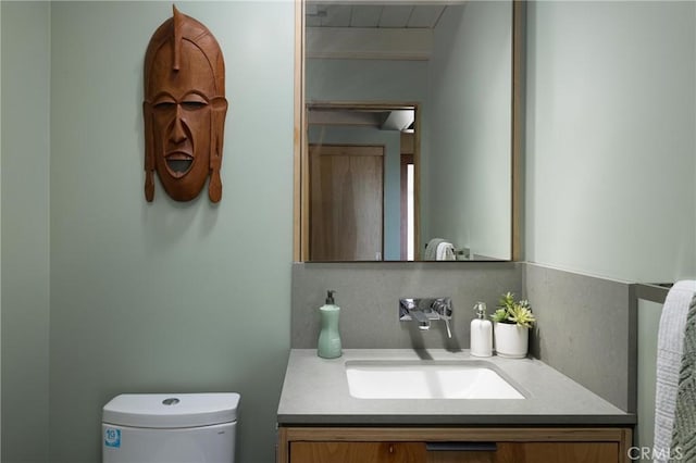 half bath with toilet and vanity