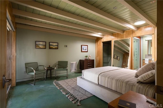 carpeted bedroom featuring beamed ceiling, baseboards, and visible vents