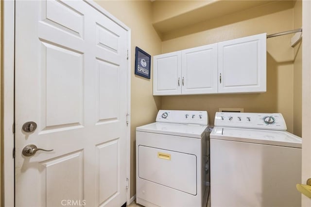 79260 Cool Reflection Ln, Quinta, CA 92253 - washroom featuring separate washer and dryer and cabinet space