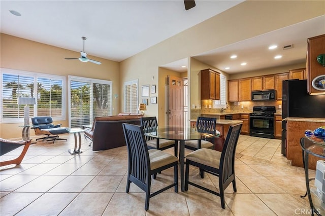 79260 Cool Reflection Ln, Quinta, CA 92253 - dining room featuring a ceiling fan, light tile patterned flooring, and recessed lighting