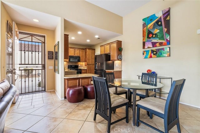 79260 Cool Reflection Ln, Quinta, CA 92253 - dining area with light tile patterned floors, baseboards, and recessed lighting