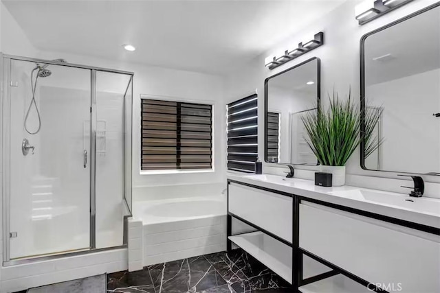 full bathroom featuring double vanity, a stall shower, a sink, a bath, and marble finish floor