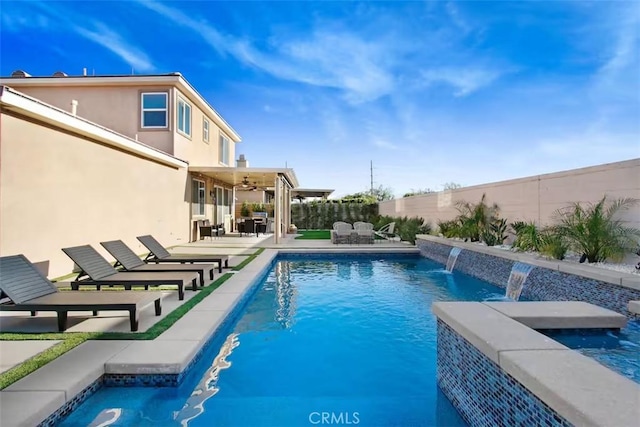 view of pool with a patio, a ceiling fan, outdoor dining space, a fenced backyard, and a fenced in pool