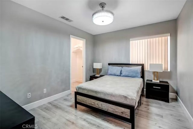 43118 Fiore St, Indio, CA 92203 - bedroom with baseboards, visible vents, and light wood-style floors