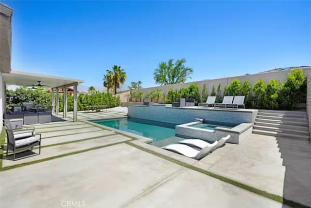 43118 Fiore St, Indio, CA 92203 - view of swimming pool featuring a patio, an in ground hot tub, a fenced in pool, and ceiling fan