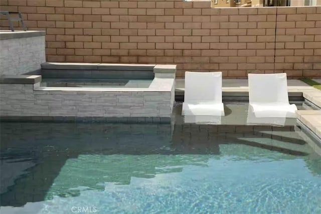 43118 Fiore St, Indio, CA 92203 - details with fence and a swimming pool