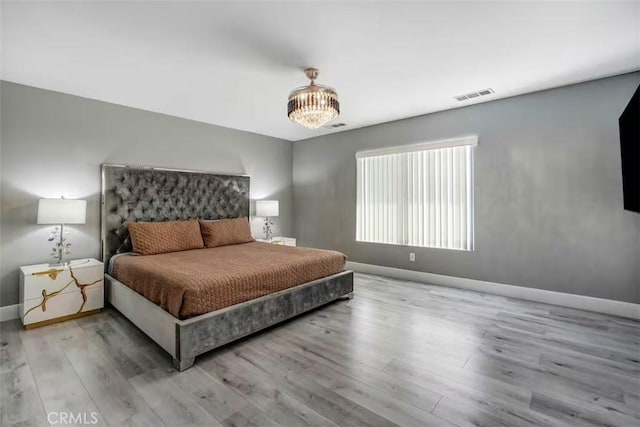 43118 Fiore St, Indio, CA 92203 - bedroom featuring light wood-style floors, visible vents, and baseboards