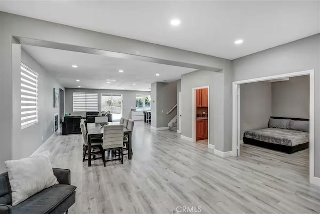 43118 Fiore St, Indio, CA 92203 - dining room with baseboards, stairs, recessed lighting, and light wood-type flooring