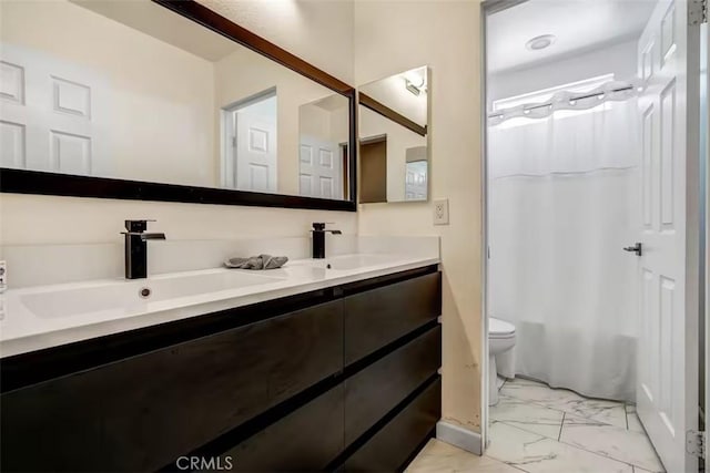 43118 Fiore St, Indio, CA 92203 - full bathroom featuring a sink, double vanity, toilet, and marble finish floor