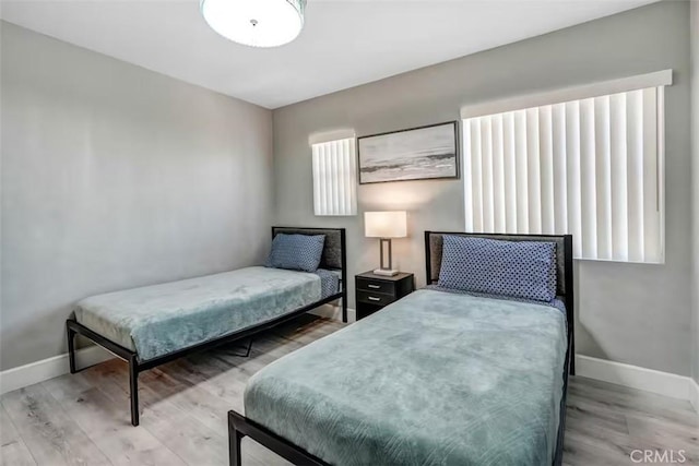43118 Fiore St, Indio, CA 92203 - bedroom featuring baseboards and wood finished floors