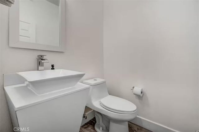 43118 Fiore St, Indio, CA 92203 - bathroom featuring vanity, toilet, and baseboards