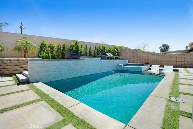 43118 Fiore St, Indio, CA 92203 - view of pool with an in ground hot tub, a fenced in pool, and fence