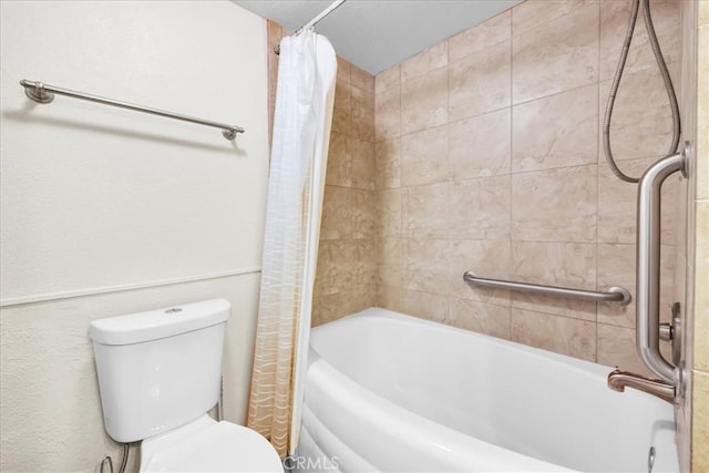 bathroom with toilet and shower / bath combo with shower curtain