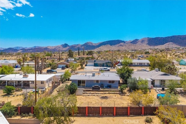 aerial view with a mountain view and a residential view