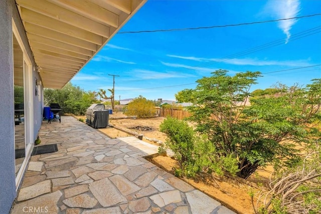 view of patio / terrace with fence