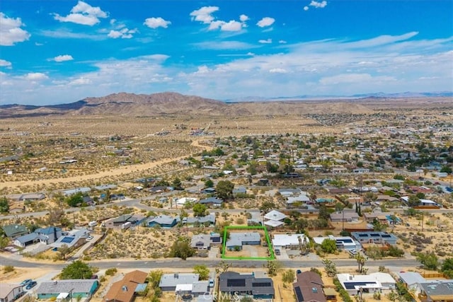 bird's eye view featuring view of desert, a residential view, and a mountain view