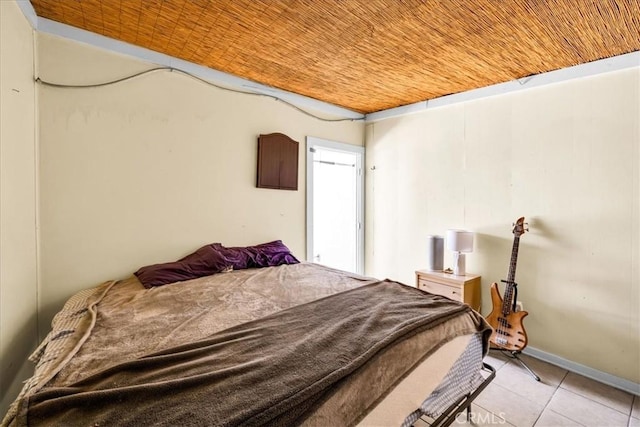 bedroom with light tile patterned flooring