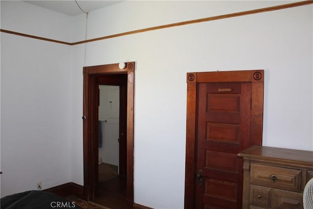bedroom with baseboards