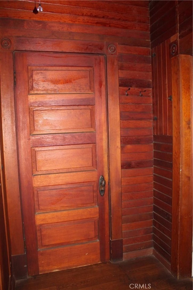 room details featuring wooden walls