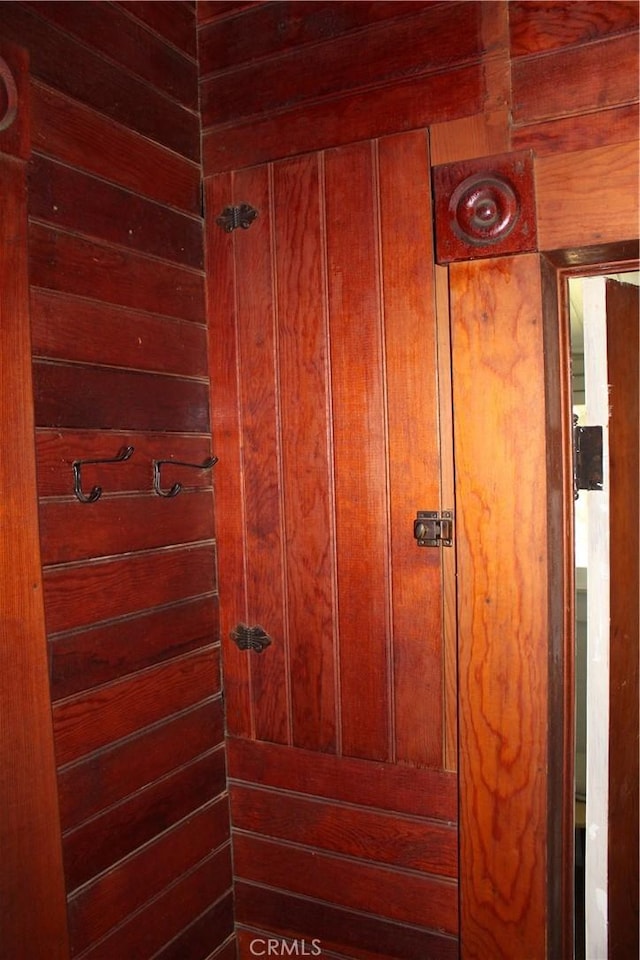room details featuring wood walls