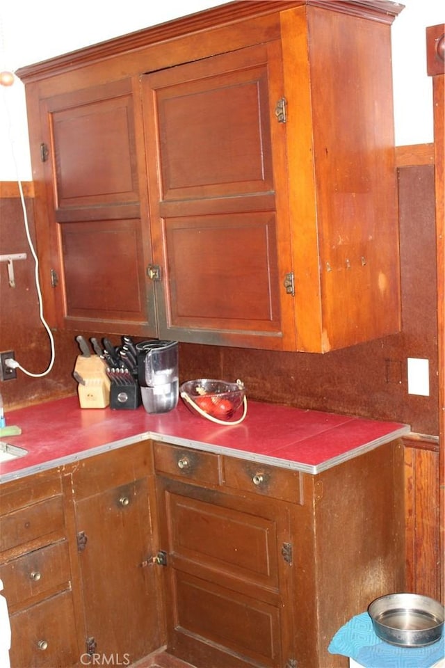 kitchen featuring brown cabinets