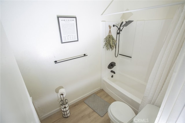 73881 Siesta Dr Unit 29, Palms, CA 92277 - full bath featuring toilet, baseboards, shower / tub combo, and wood finished floors