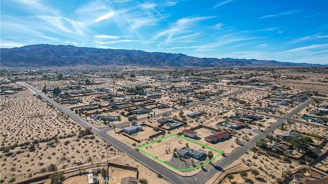 73881 Siesta Dr Unit 29, Palms, CA 92277 - bird's eye view with view of desert, a mountain view, and a residential view