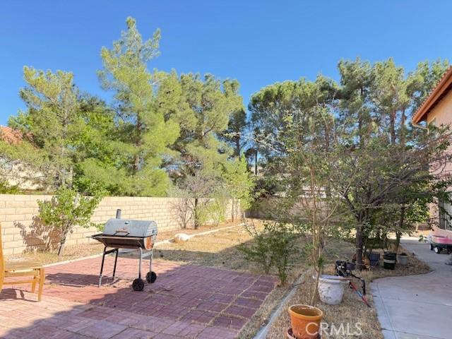 41854 Cabo Ct, Palmdale, CA 93551 - view of patio / terrace with fence and area for grilling