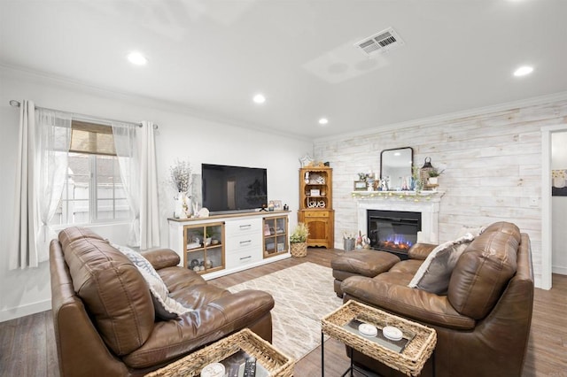 586 Del Mar Ave, Chula Vista, CA 91910 - living room with crown molding, baseboards, wood finished floors, recessed lighting, and a glass covered fireplace