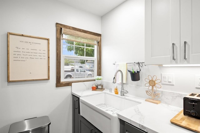586 Del Mar Ave, Chula Vista, CA 91910 - kitchen with a sink and light stone countertops