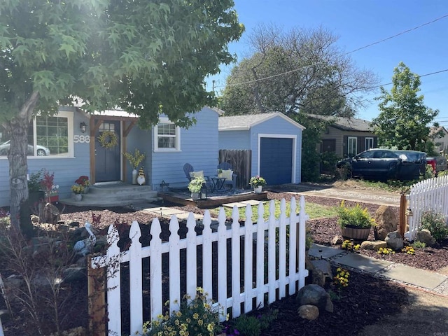 586 Del Mar Ave, Chula Vista, CA 91910 - view of front of home featuring fence, a garage, an outbuilding, and driveway